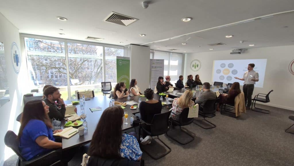 A room of payroll professionals learning