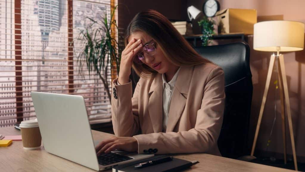 stressed female working in an office